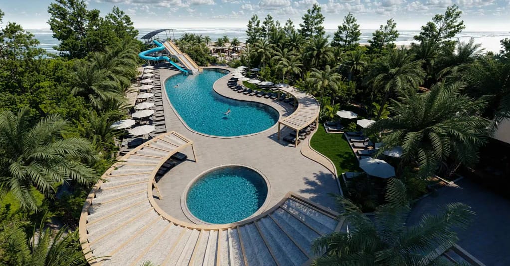 Poolanlage im Calido Sol Hotel Okurcalar mit Wasserrutschen und Palmen direkt an der Türkischen Riviera